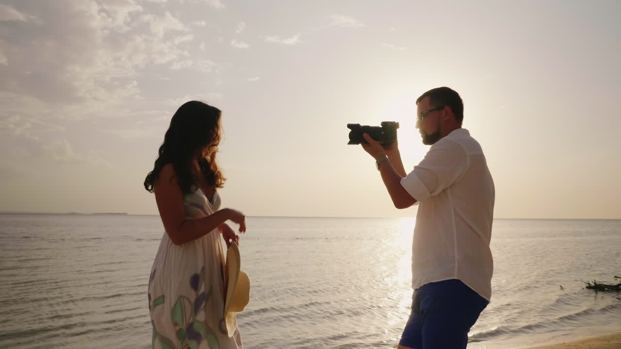 The Husband Takes Pictures Of His Young Wife On The Beach Happy Holidays Together 4k Video