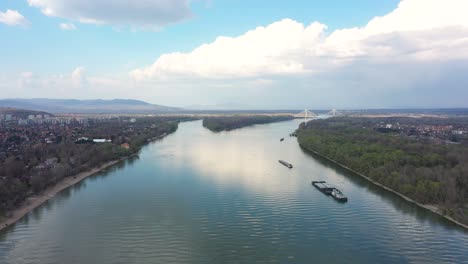 drone footage from danube river in spring nice weather, budapest drone moves fast forward on high altitude