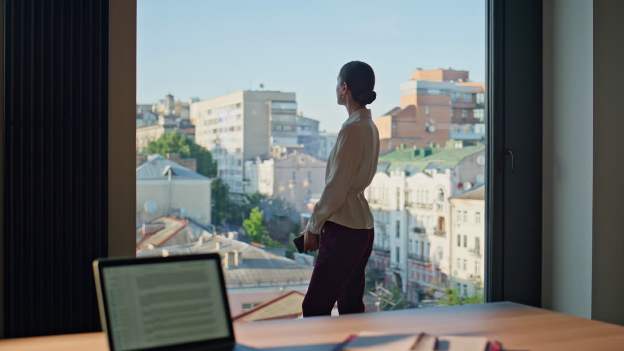 Successful businesswoman standing window modern office. Elegant business lady