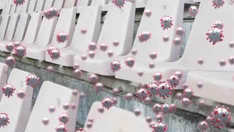 células de covid-19 contra asientos vacíos en el estadio deportivo