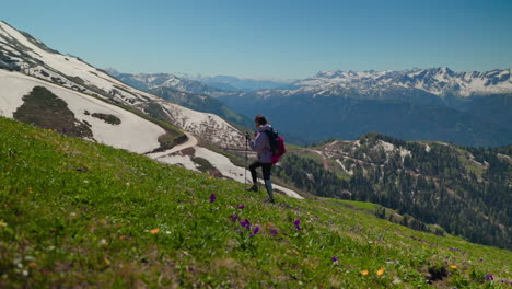 woman hiking in snowy mountains