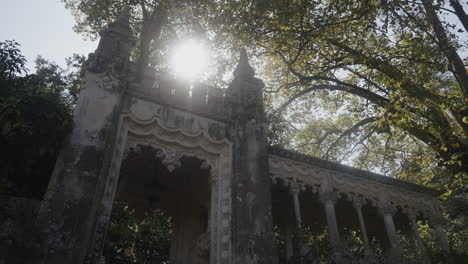 ornate stone archway in quinta da regaleira park