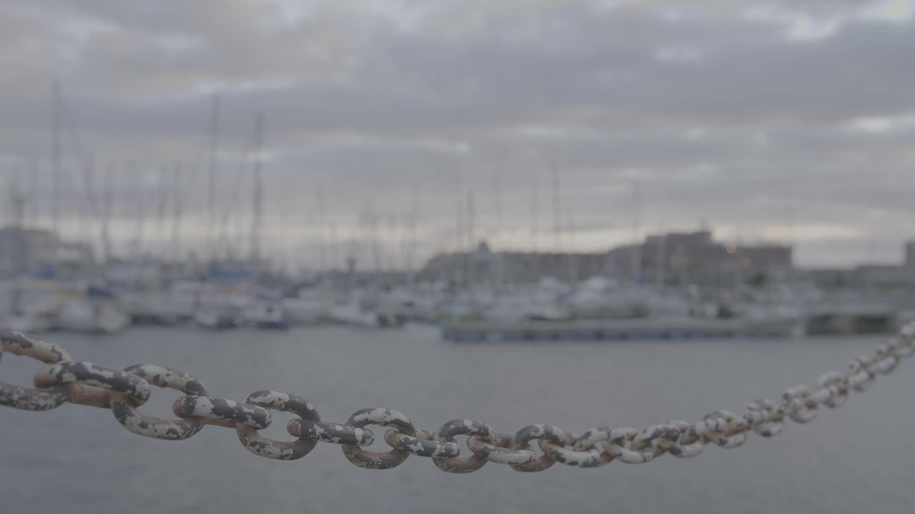 B Roll shot of a chain along a pier in Kalk Bay harbour, Cape Town