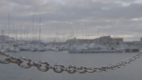 B Roll shot of a chain along a pier in Kalk Bay harbour, Cape Town