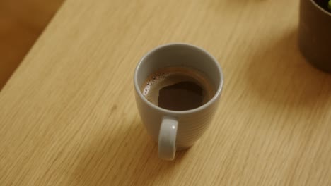 top-shot-with-a-mug-with-Turkish-coffee-on-a-table