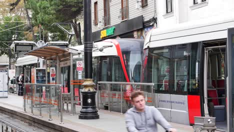 people waiting for a tram at a subway station