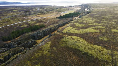 Beautiful aerial of Langist&iacute;gur canyon in Thingvellir in Iceland on a sunny day