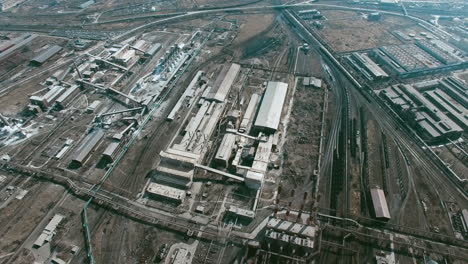 aerial view of industrial zone with factories expelling smoke around a green landscape 3