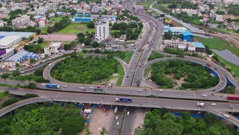 aerial view of maduravoyal bypass flyover bridge push in shot, drone, 4k, day time, in chennai, tamil nadu, india.