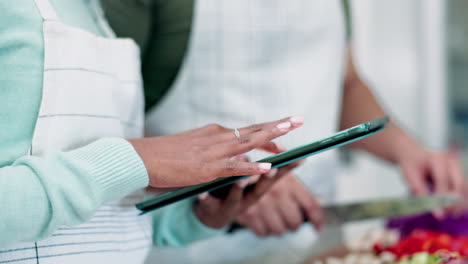 Hands,-tablet-and-couple-cooking-in-kitchen