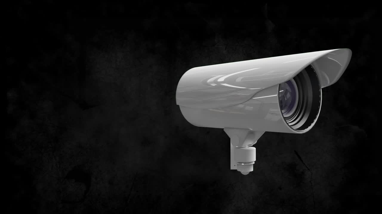 Animazione di una telecamera di sicurezza, con linee di interferenza, che si muove su sfondo nero.