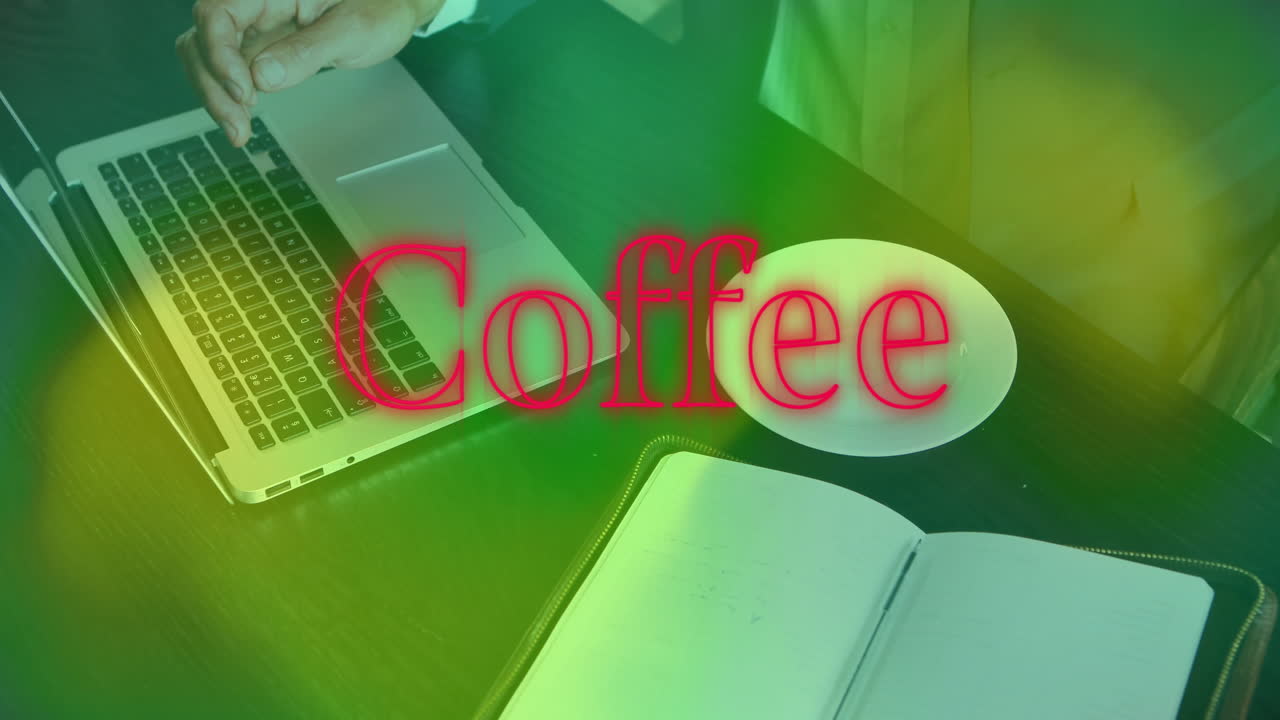 man typing on laptop in business office, with animated graphs floating above coffee cup