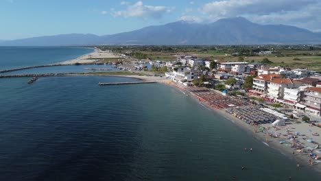 the beach resort of paralia katerini with the olympus mount in the background, greece