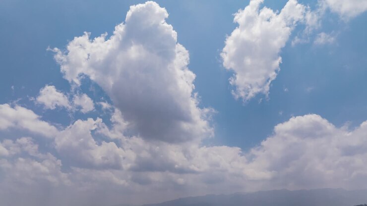 Hyperlapse of bright clouds and blue sky 4k