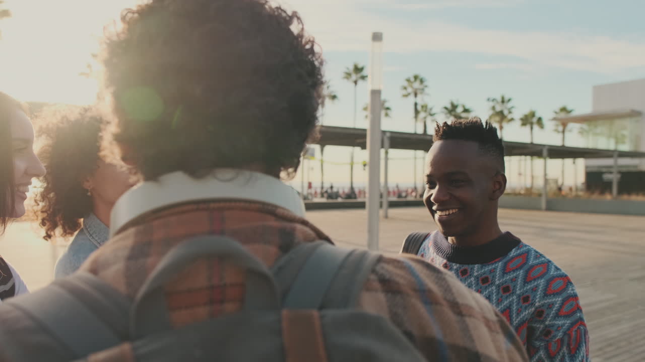 People exploring a city near the beach