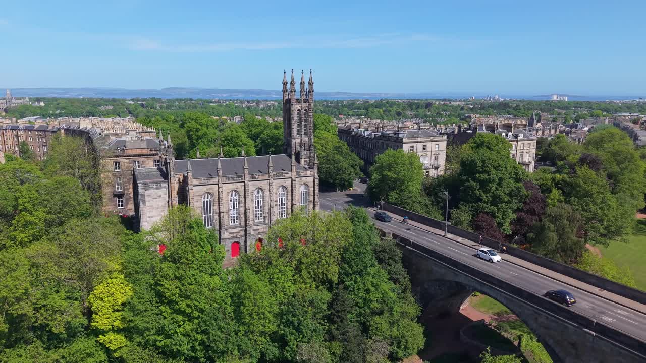 Drone orbit around Rhema Christian Church and Dean Bridge, unveiling Edinburgh’s stunning gothic charm and the surrounding cityscape