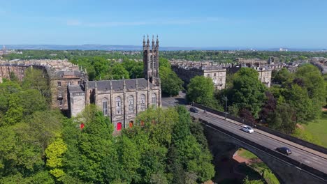 drone orbit around rhema christian church and dean bridge, unveiling edinburgh’s stunning gothic charm and the surrounding cityscape