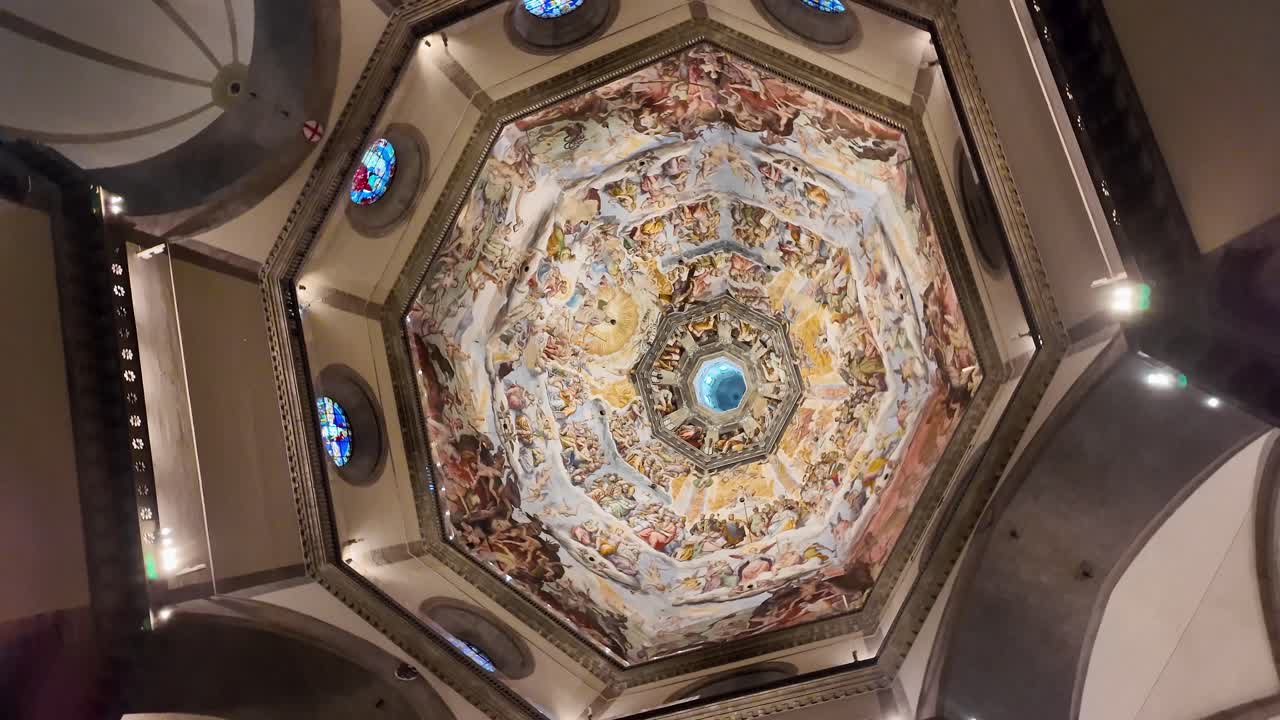 Orbital view of The Last Judgment frescoes by Giorgio Vasari and Federico Zuccari inside the dome of Santa Maria del Fiore in Florence, Italy, highlighting scale, color, and Renaissance artistry