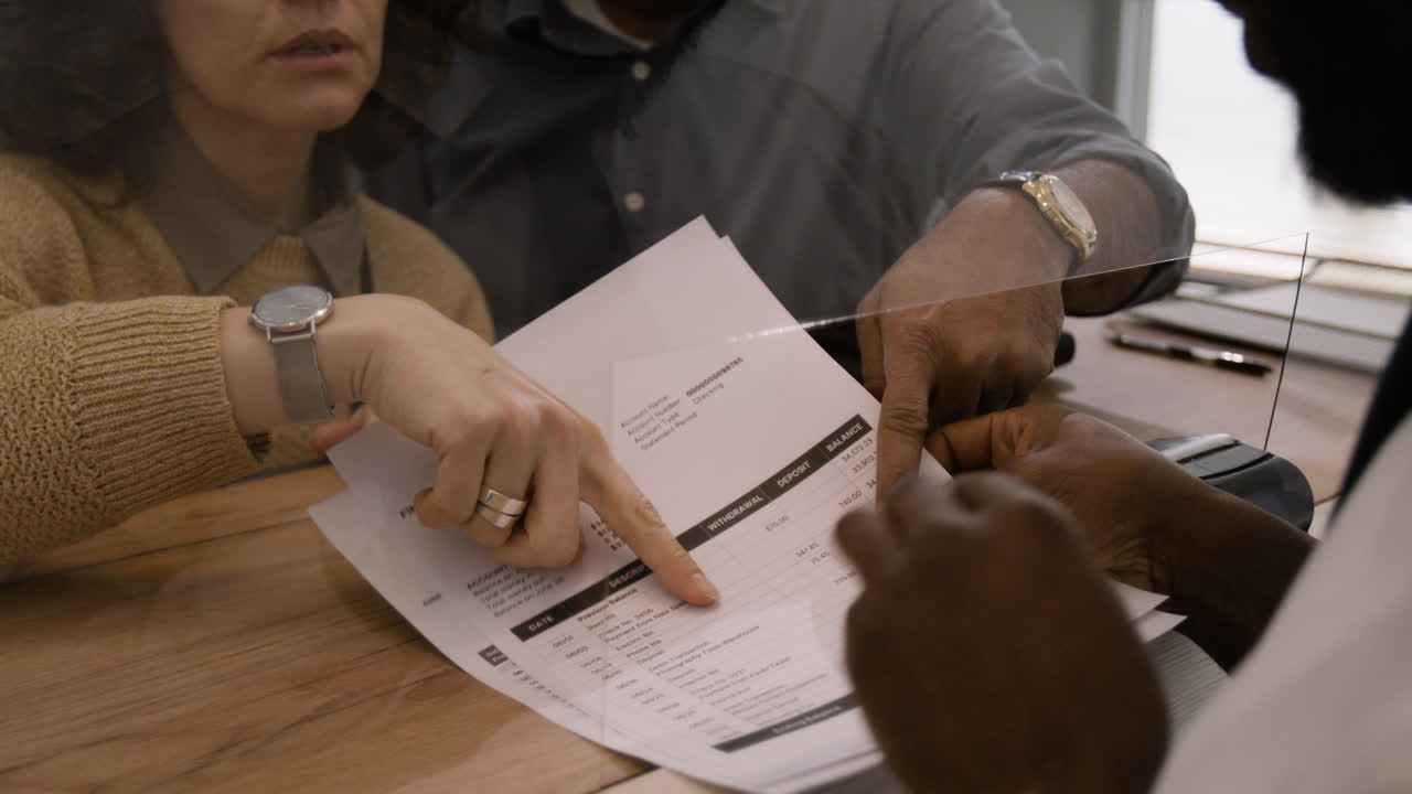 People Reviewing Financial Documents