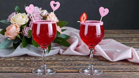 strawberry cocktails with pink heart decorations