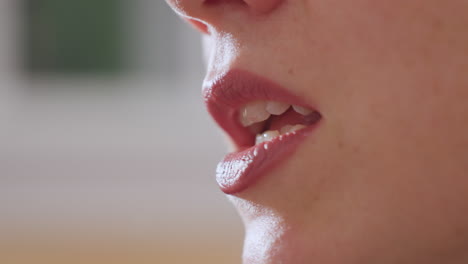 close up of therapist lips moving as she speaks softly with subtle mouth expressions, captured against blurred background to emphasize details of speech and conveying warmth and professionalism