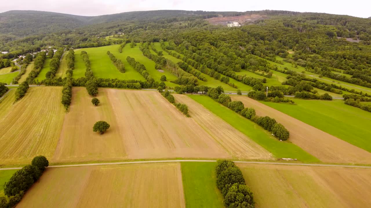 Drone flight over small fields in the Rh&ouml;n in late summer