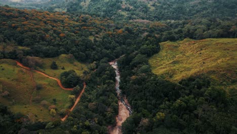 aerial forward reveal over nauyaca waterfalls in costa rica