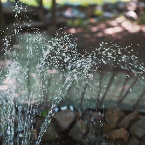 water fountain. fountain in the garden. water drops