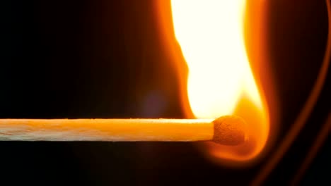 burning match and flame