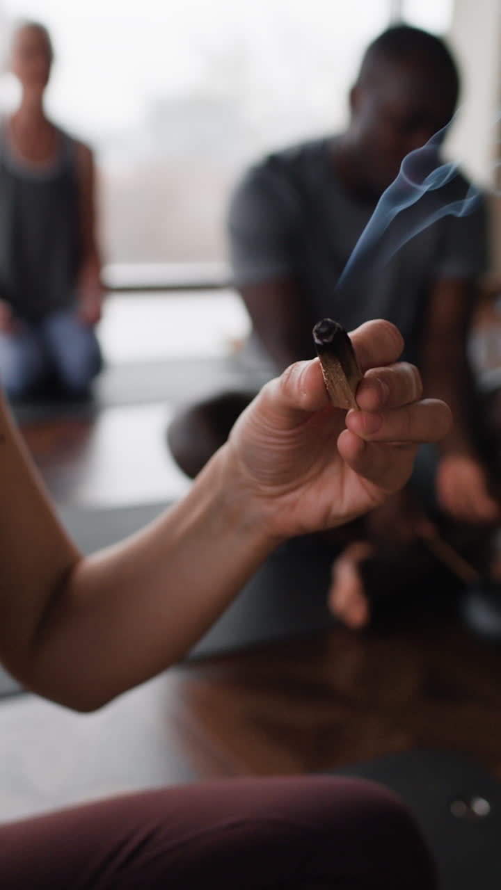 Yoga class with incense