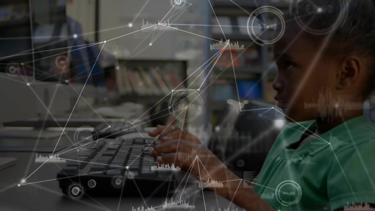 Student tapping keyboard and activating network graphics pulsing across computer lab for education