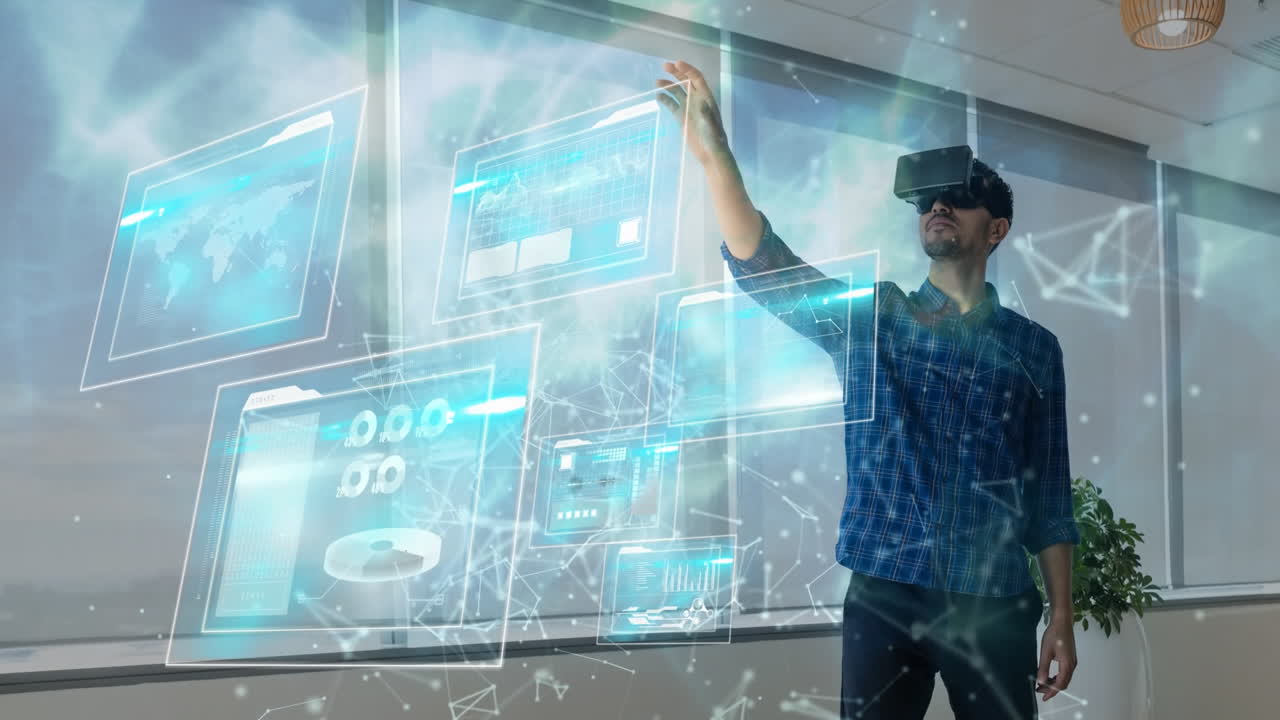 Using virtual reality headset, man interacting with digital data screens in office