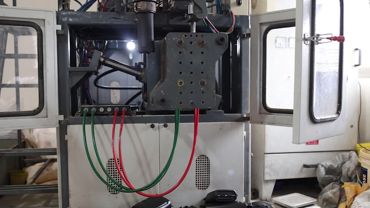 wide angel shot of making a lubricant oil bottle in machine, industry 5.0