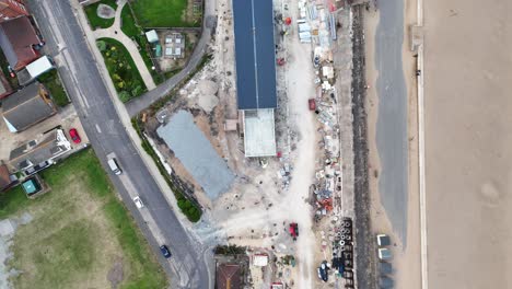 aerial view of construction site near beach
