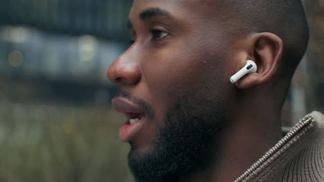 man listening to music outdoors