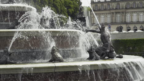 handheld shot of a fountain on the island of herrnchiemsee on the herreninsel with the herrenchiemsee