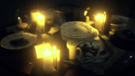 candlelit dinner setting revealing forgotten moments and untouched meals