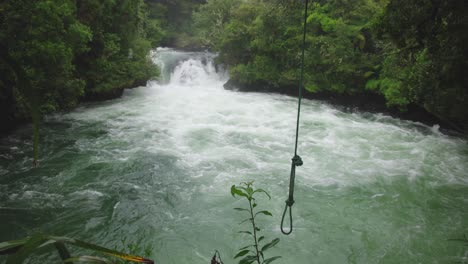 river-rapids-rushing-over-a-waterfall