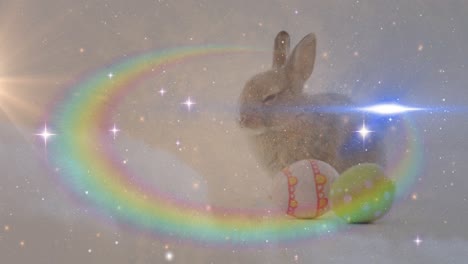 Composite-video-of-space-against-easter-bunny-and-decorative-easter-eggs-in-background