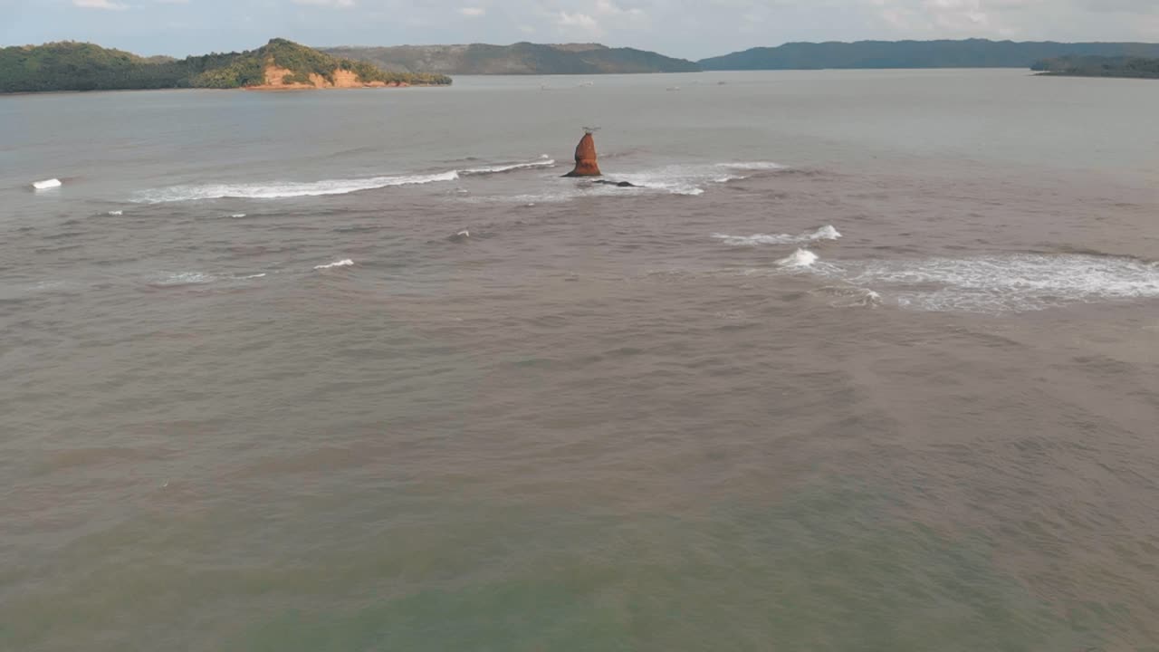 Aerial View of a Unique Rock Formation in the Ocean