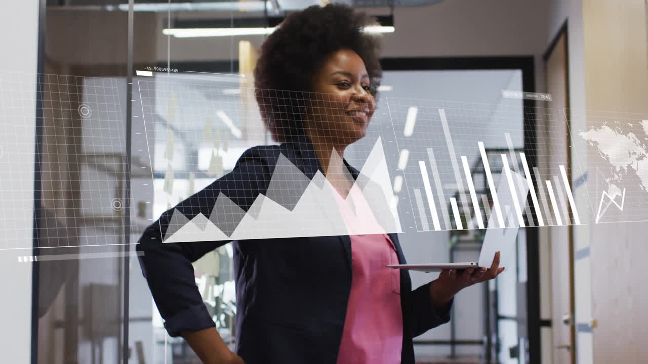 Analyzing data charts on laptop, businesswoman working in modern office environment