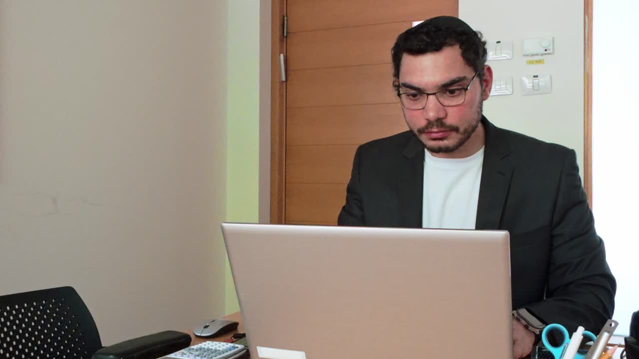 Man at Desk: Modern Office Workflow