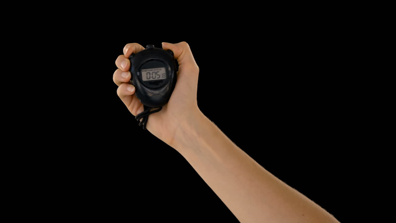 manos con un temporizador