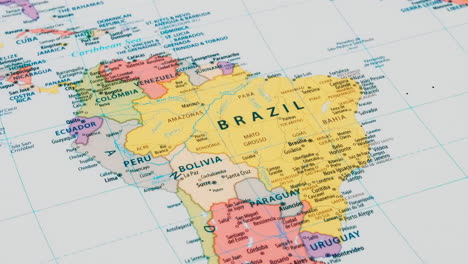 close-up of the country word brazil on a world map with the detailed name of the capital city