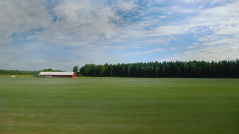 traveling in norway - view from the side window of the car beautiful rural landscape