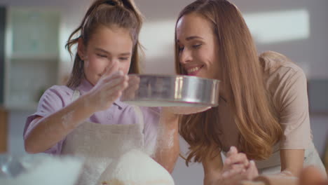 Mother-and-daughter-making-bread