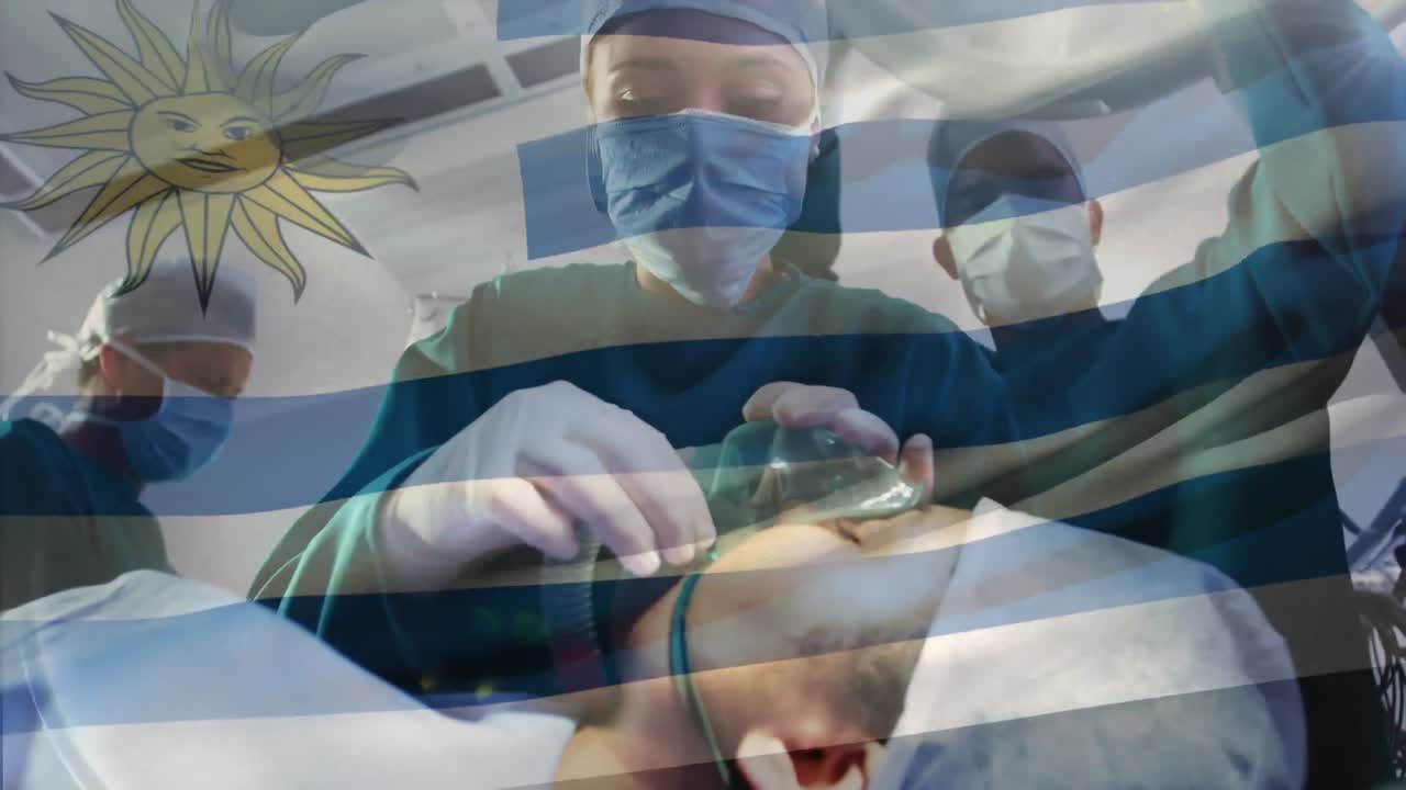 animación de la bandera de uruguay ondeando sobre los cirujanos en la sala de operaciones
