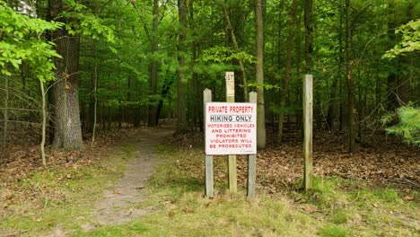 the sign at an entrance to a trail system in michigan