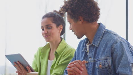 Couple-With-Digital-Tablet-Running-Online-Business-From-Home