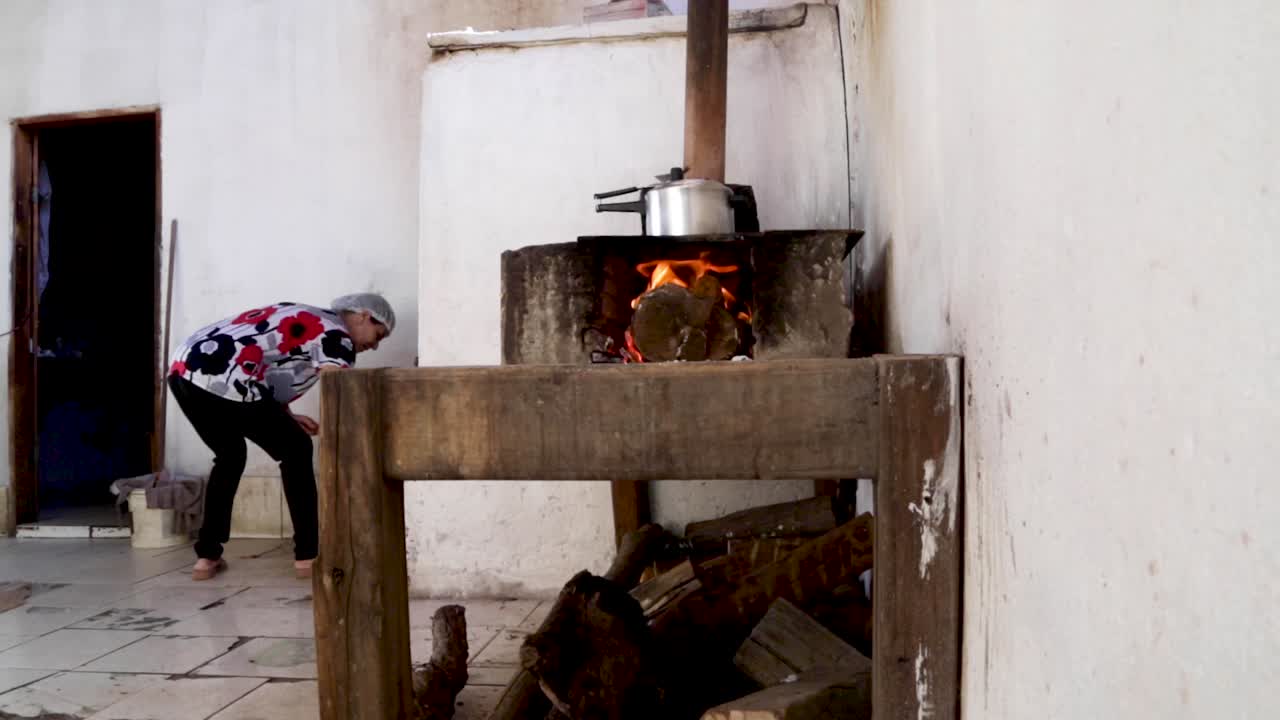A woman prepares bread and cookies